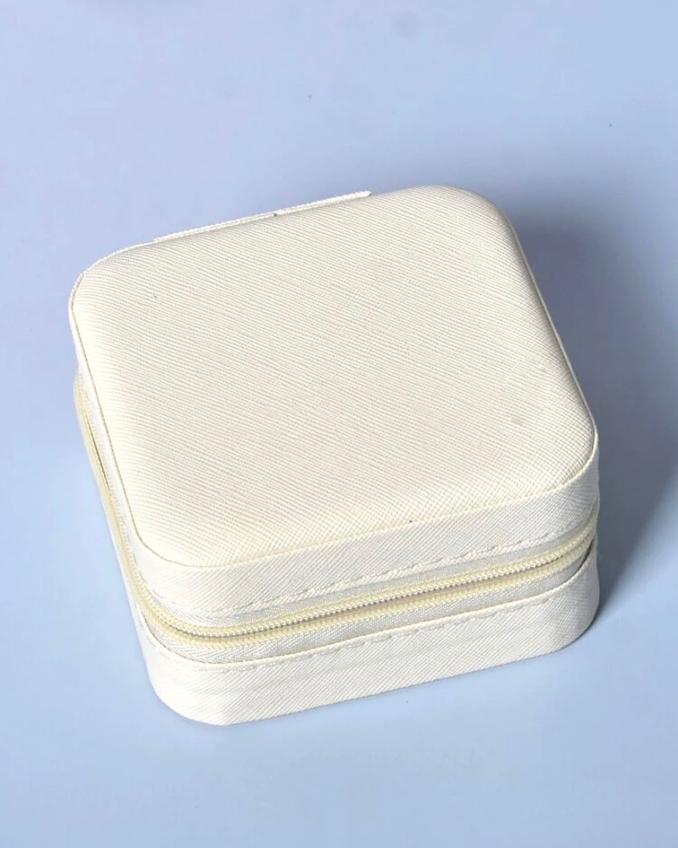 Cream travel jewelry case