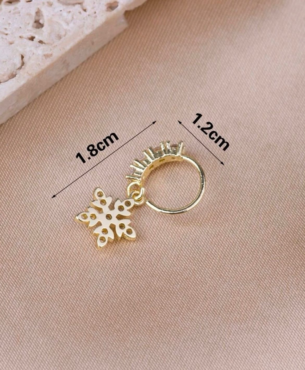 Gold rhinestone snowflake nose ring