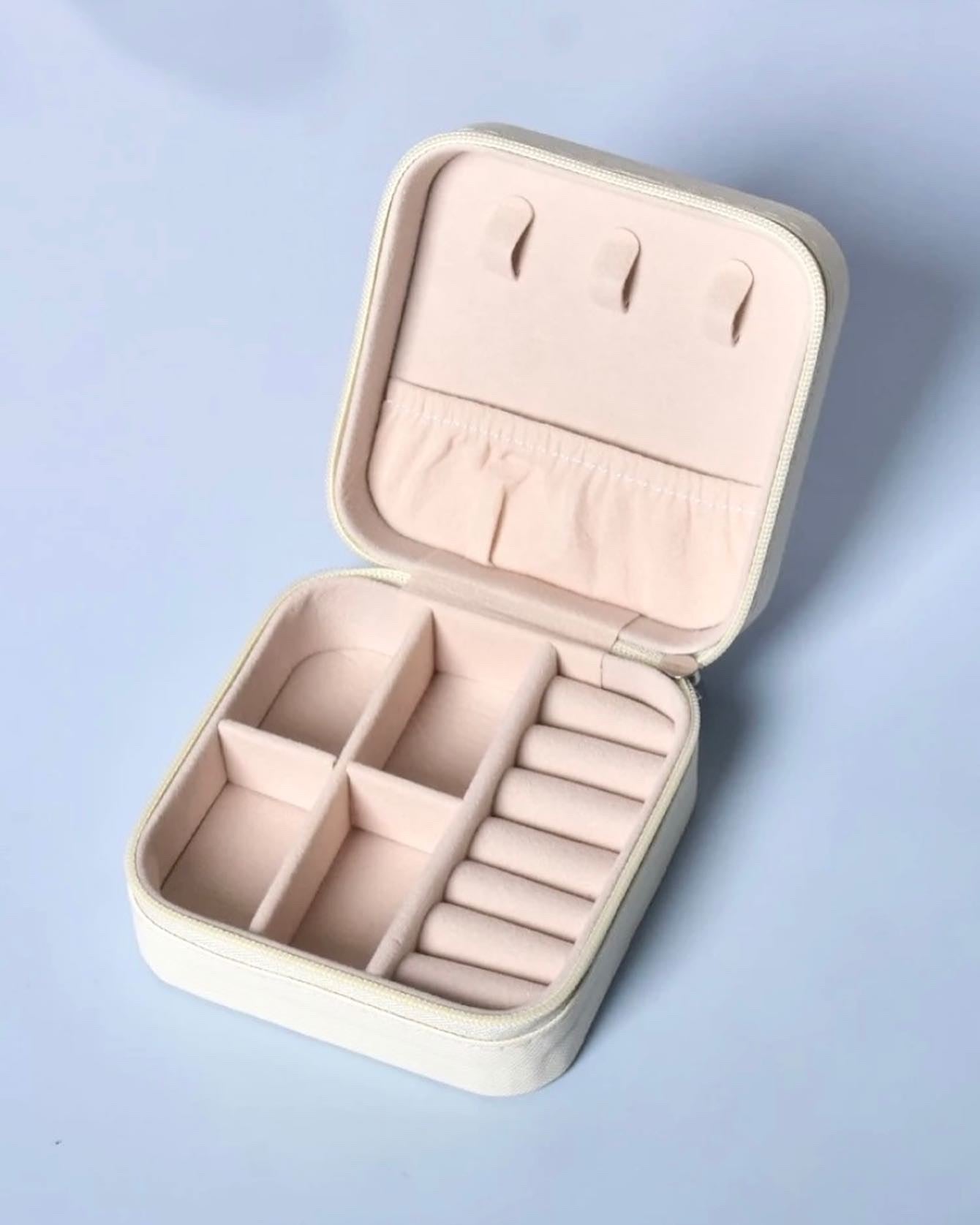 Cream travel jewelry case