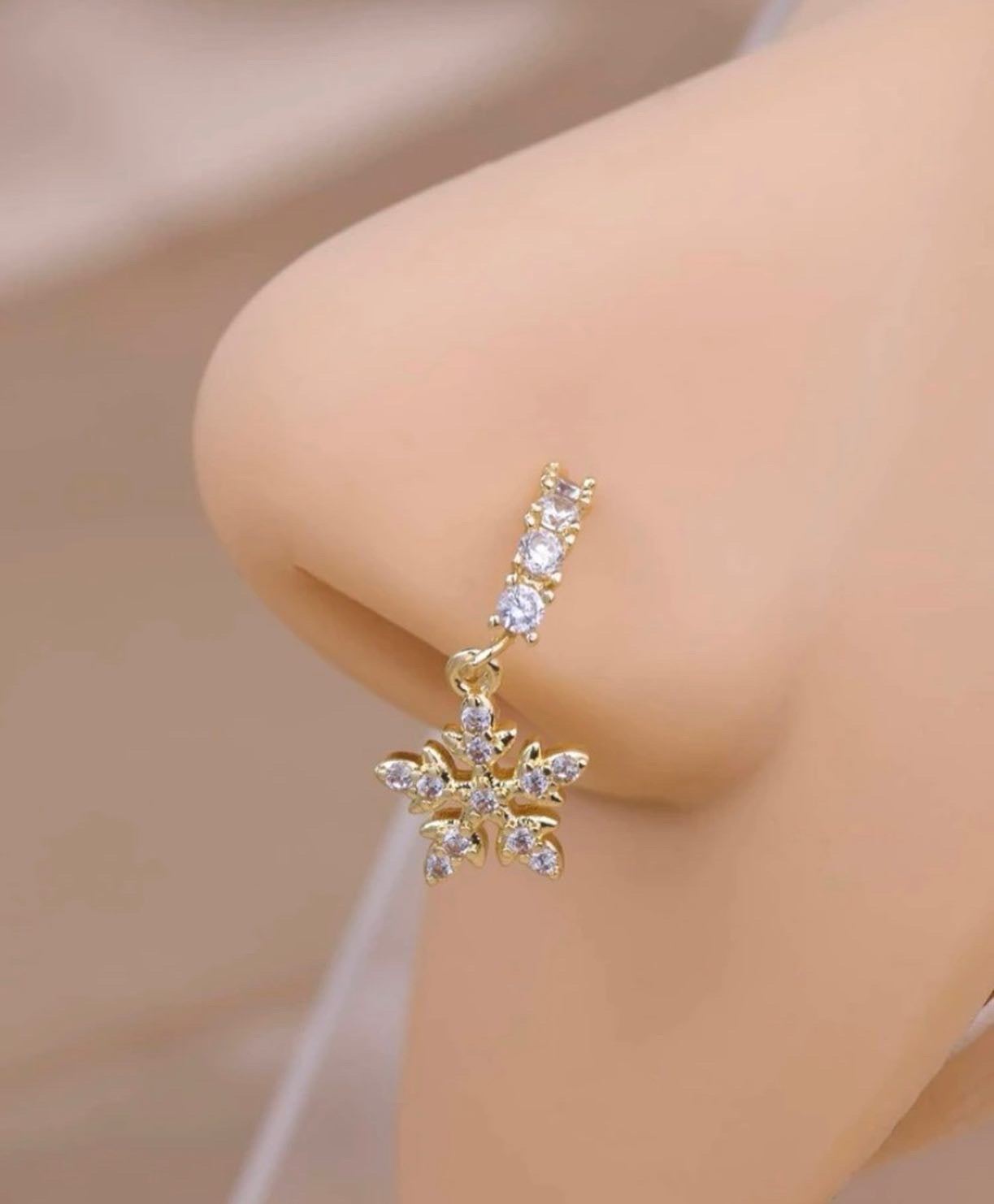 Gold rhinestone snowflake nose ring